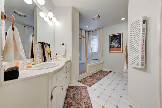 608 Shadow View Ct, Norman, OK 73072 - full bath featuring double vanity, an enclosed shower, toilet, baseboards, and recessed lighting