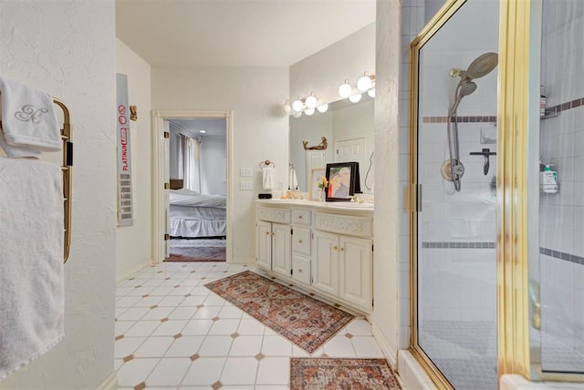 608 Shadow View Ct, Norman, OK 73072 - bathroom featuring a stall shower, vanity, connected bathroom, and tile patterned floors