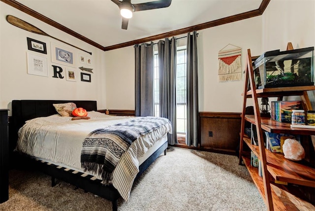 608 Shadow View Ct, Norman, OK 73072 - bedroom featuring crown molding, carpet flooring, wainscoting, and a ceiling fan