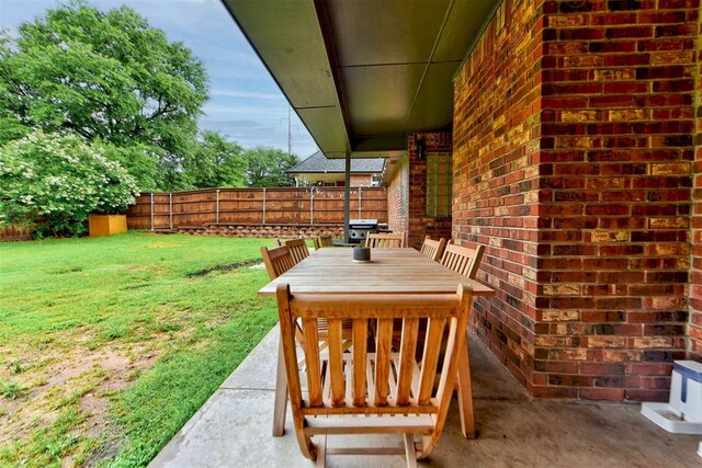 608 Shadow View Ct, Norman, OK 73072 - view of patio with area for grilling and outdoor dining area