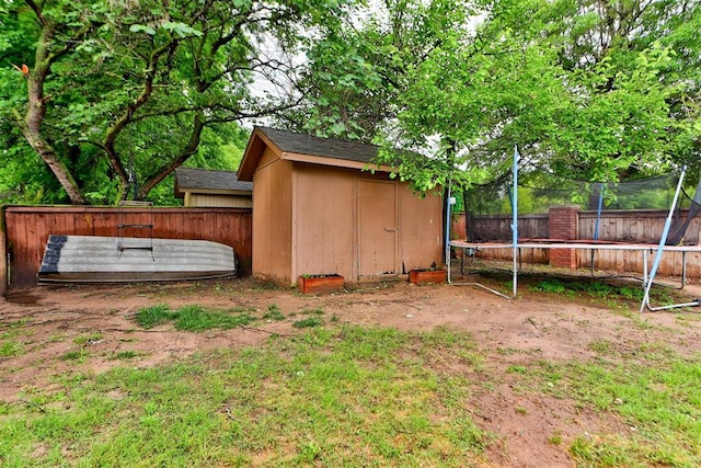 608 Shadow View Ct, Norman, OK 73072 - fenced backyard with a trampoline