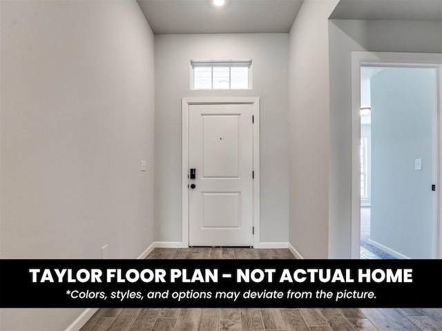8509 NW 76th St, Oklahoma City, OK 73132 - entryway featuring wood finished floors and baseboards