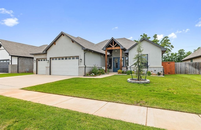 4813 Hambletonian Ln, Mustang, OK 73064 - view of front of home with an attached garage, stucco siding, and concrete driveway