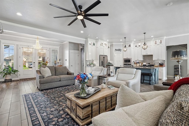 4813 Hambletonian Ln, Mustang, OK 73064 - living room featuring a ceiling fan, ornamental molding, and recessed lighting