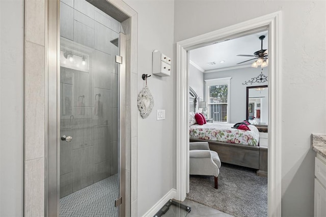 4813 Hambletonian Ln, Mustang, OK 73064 - bathroom featuring ensuite bathroom, a stall shower, ceiling fan, vanity, and crown molding