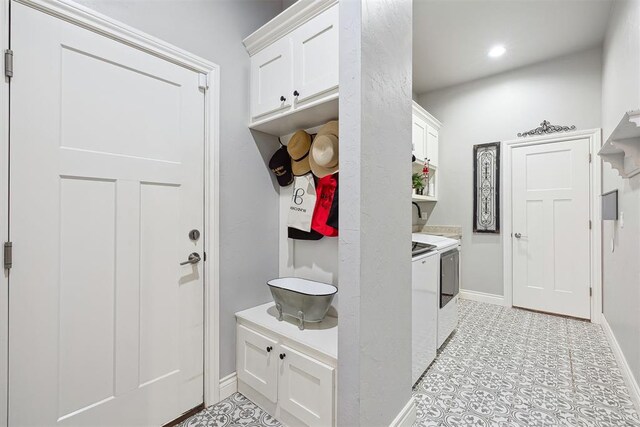 4813 Hambletonian Ln, Mustang, OK 73064 - mudroom with separate washer and dryer, baseboards, and recessed lighting