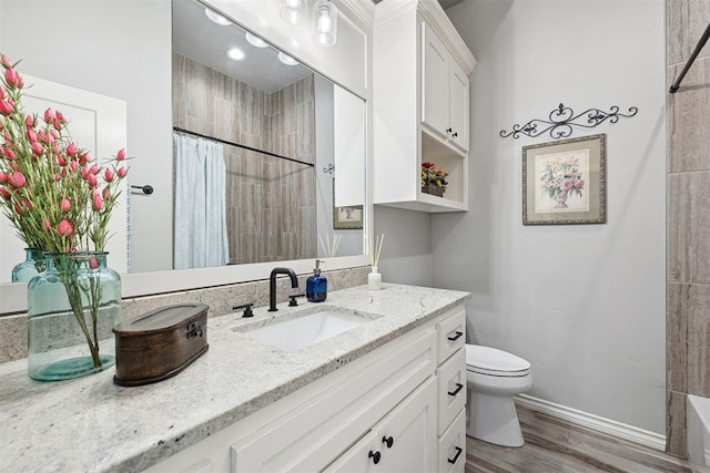 4813 Hambletonian Ln, Mustang, OK 73064 - full bathroom with vanity, toilet, a shower with curtain, and wood finished floors