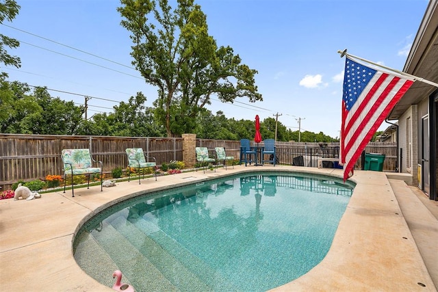 4813 Hambletonian Ln, Mustang, OK 73064 - view of swimming pool featuring a fenced backyard and a patio