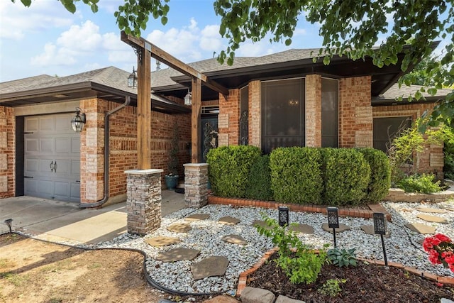 704 N Geronimo Way, Mustang, OK 73064 - single story home with brick siding, a garage, and roof with shingles