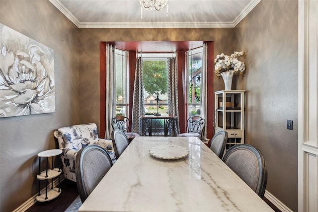 704 N Geronimo Way, Mustang, OK 73064 - dining space with ornamental molding, wood finished floors, and a chandelier