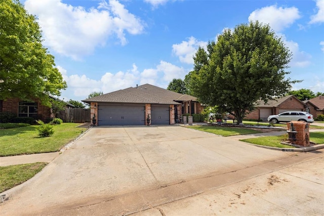 704 N Geronimo Way, Mustang, OK 73064 - view of front of property with driveway, an attached garage, brick siding, and a shingled roof