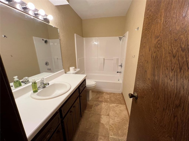 3014 S Mission St, Anadarko, OK 73005 - full bath featuring a textured wall, vanity, shower / tub combination, and stone tile floors