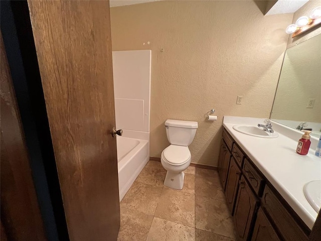 3014 S Mission St, Anadarko, OK 73005 - bathroom with double vanity and a textured wall