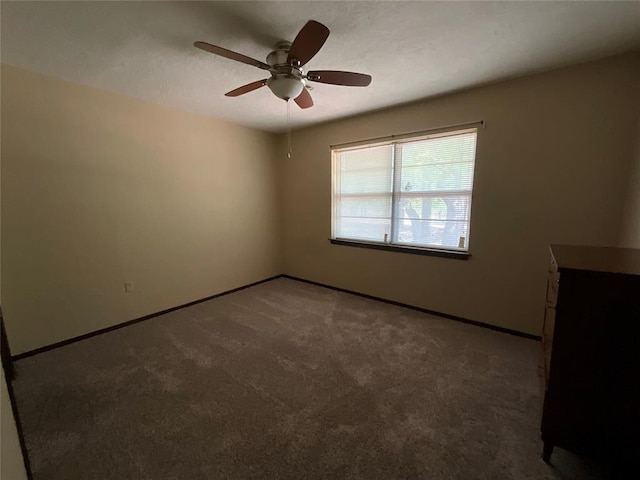 3014 S Mission St, Anadarko, OK 73005 - carpeted spare room with a ceiling fan and baseboards
