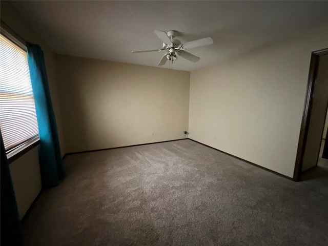 3014 S Mission St, Anadarko, OK 73005 - carpeted empty room featuring a ceiling fan and baseboards