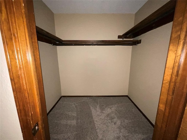 3014 S Mission St, Anadarko, OK 73005 - walk in closet featuring carpet flooring