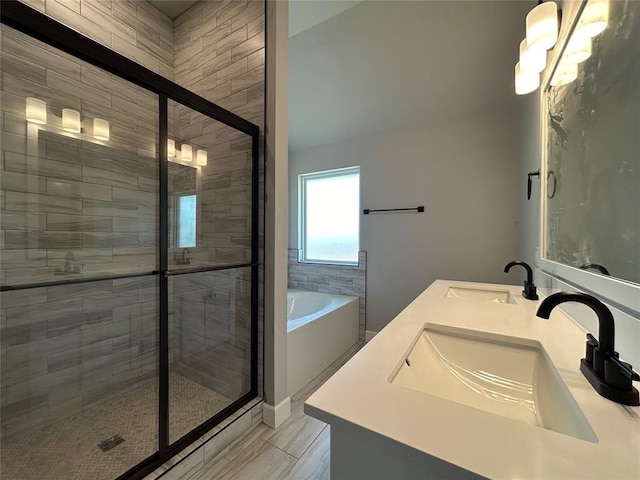 14201 Giverny Ave, Yukon, OK 73099 - bathroom with a stall shower, a garden tub, and double vanity