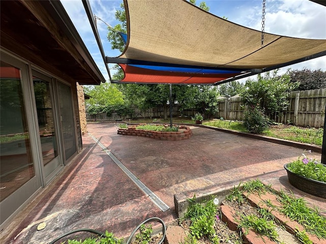 2308 Lynn Ln, Weatherford, OK 73096 - fenced backyard with a patio