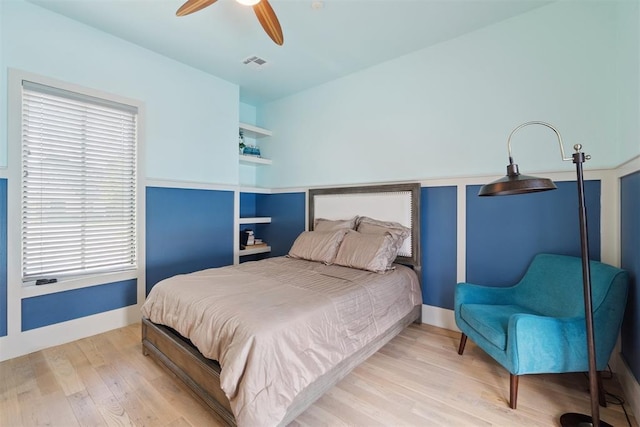 3532 NW 173rd Cir, Edmond, OK 73012 - bedroom featuring wood finished floors and a ceiling fan