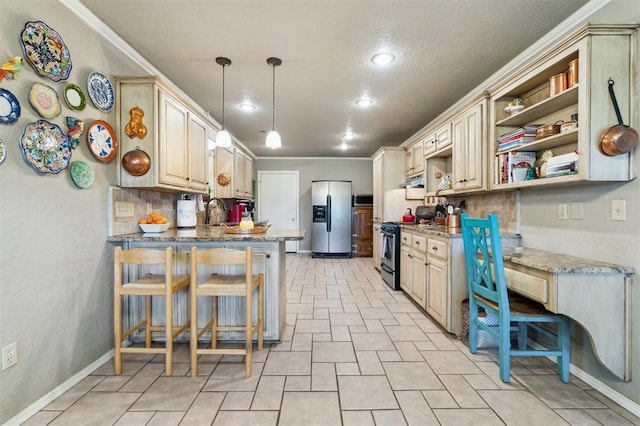 106 Dee Dee Dr, Shawnee, OK 74804 - kitchen featuring stainless steel appliances, a peninsula, open shelves, hanging light fixtures, and light stone counters