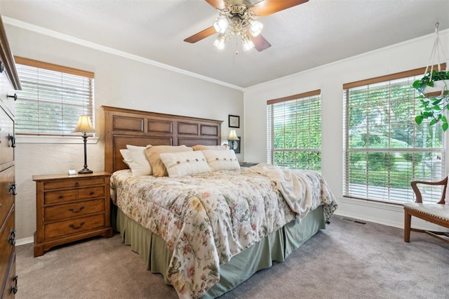 106 Dee Dee Dr, Shawnee, OK 74804 - bedroom with light carpet, ornamental molding, baseboards, and ceiling fan