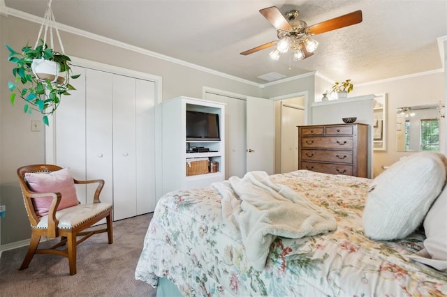 106 Dee Dee Dr, Shawnee, OK 74804 - bedroom with carpet, multiple closets, ornamental molding, and a ceiling fan