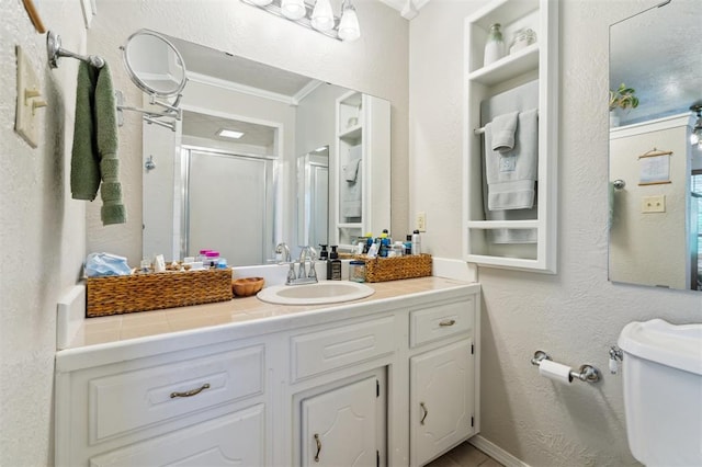 106 Dee Dee Dr, Shawnee, OK 74804 - bathroom featuring ornamental molding, toilet, a shower stall, and vanity