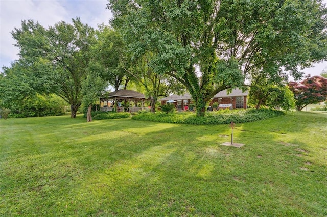 106 Dee Dee Dr, Shawnee, OK 74804 - view of green lawn with a gazebo