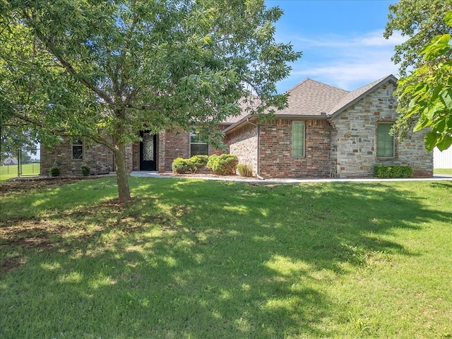 2383 Fox Ln, Blanchard, OK 73010 - view of front of property with a front lawn and brick siding