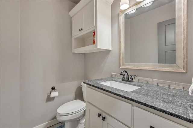 2383 Fox Ln, Blanchard, OK 73010 - half bath with vanity, toilet, and baseboards