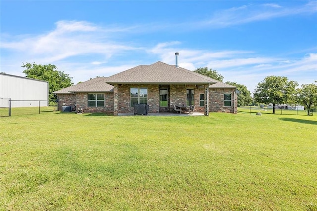 2383 Fox Ln, Blanchard, OK 73010 - rear view of property featuring a patio, roof with shingles, brick siding, and cooling unit