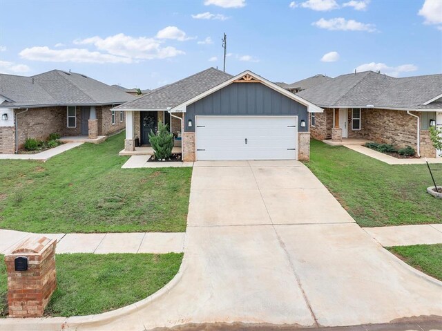 19908 Taggert Dr, Edmond, OK 73012 - ranch-style house featuring board and batten siding, an attached garage, a front yard, and concrete driveway