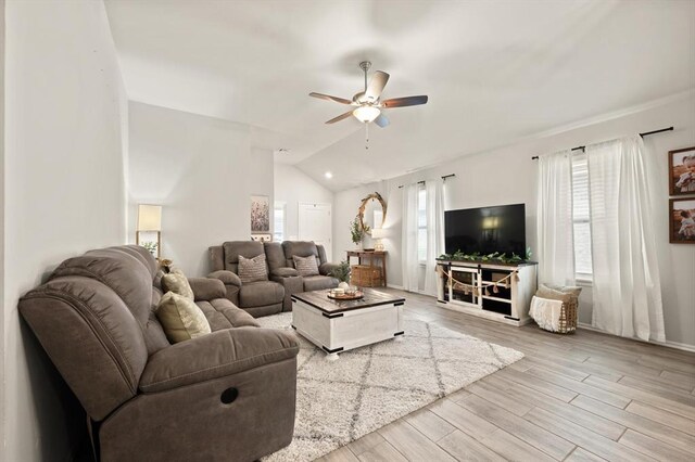 19908 Taggert Dr, Edmond, OK 73012 - living room featuring ceiling fan, lofted ceiling, and wood finished floors