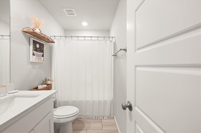 19908 Taggert Dr, Edmond, OK 73012 - full bathroom featuring vanity and toilet