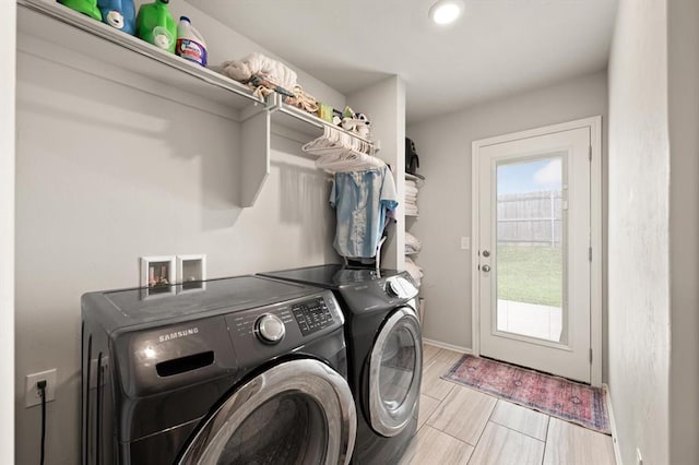 19908 Taggert Dr, Edmond, OK 73012 - laundry room with washer and dryer and baseboards
