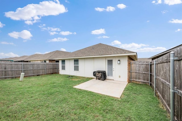 19908 Taggert Dr, Edmond, OK 73012 - rear view of house with a patio area and a shingled roof