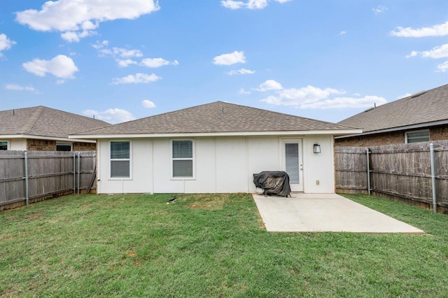 19908 Taggert Dr, Edmond, OK 73012 - back of house featuring a patio and a shingled roof