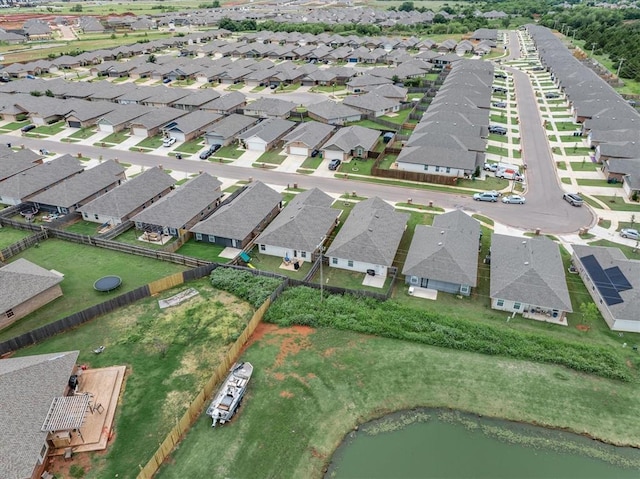 19908 Taggert Dr, Edmond, OK 73012 - aerial view of property's location with nearby suburban area and a nearby body of water