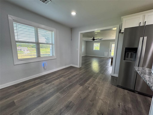1304 W Walnut St, Tecumseh, OK 74873 - unfurnished dining area with dark wood-style floors, a ceiling fan, and recessed lighting