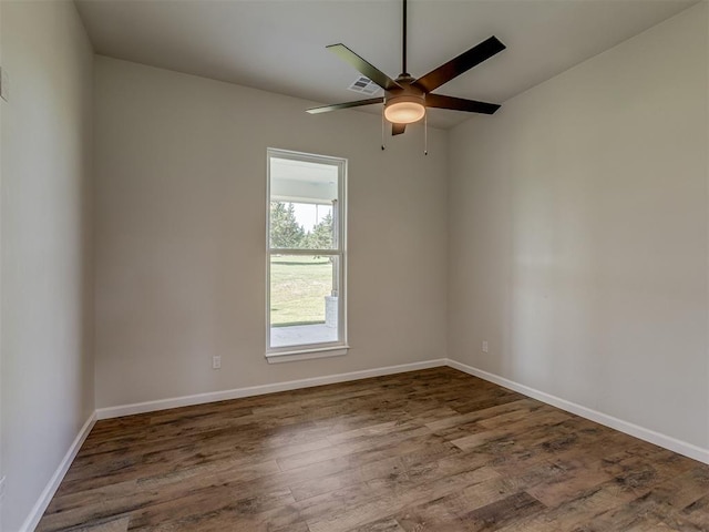 5812 Cimarron Mnr, Guthrie, OK 73044 - spare room featuring a ceiling fan and wood finished floors