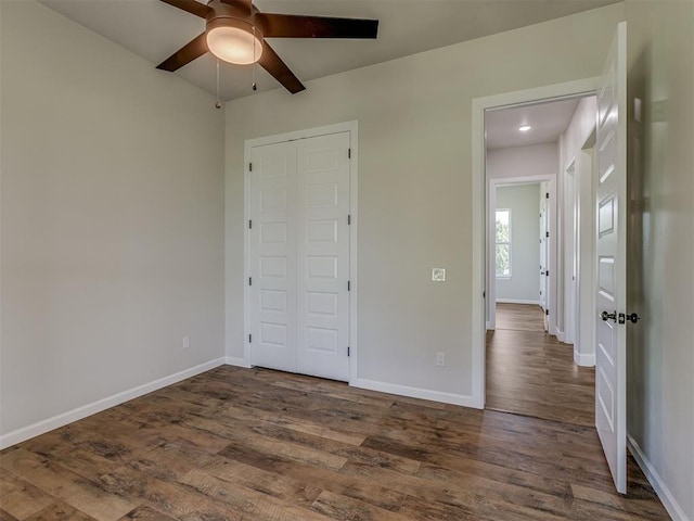 5812 Cimarron Mnr, Guthrie, OK 73044 - unfurnished bedroom with dark wood-type flooring, ceiling fan, and recessed lighting
