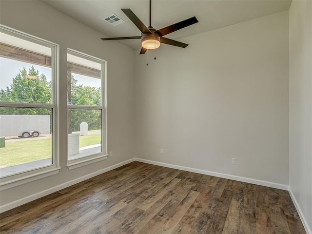 5812 Cimarron Mnr, Guthrie, OK 73044 - spare room with ceiling fan and dark wood-type flooring
