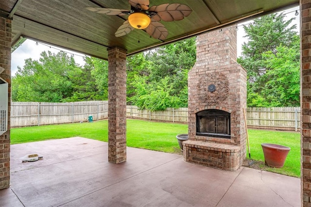 328 SW 175th Ter, Oklahoma City, OK 73170 - view of patio / terrace featuring an outdoor brick fireplace and ceiling fan