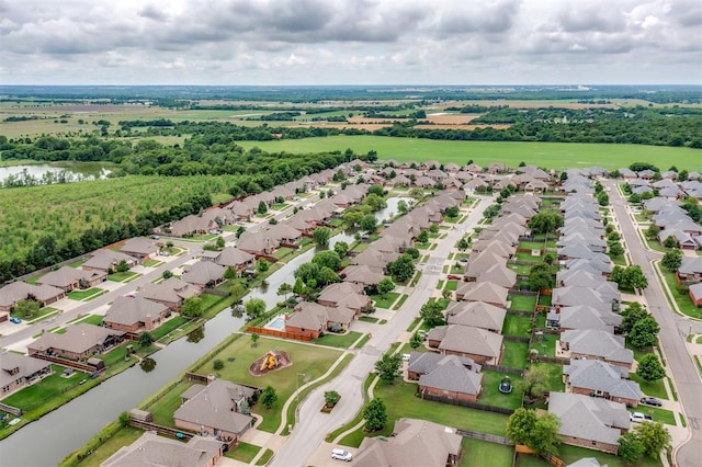 328 SW 175th Ter, Oklahoma City, OK 73170 - aerial perspective of suburban area with a large body of water