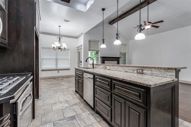 328 SW 175th Ter, Oklahoma City, OK 73170 - kitchen featuring a sink, dishwasher, a fireplace, baseboards, and crown molding