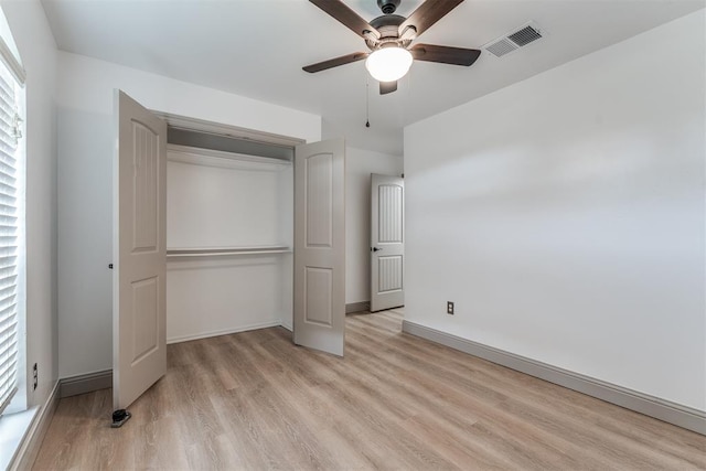 328 SW 175th Ter, Oklahoma City, OK 73170 - unfurnished bedroom with light wood-style floors, a closet, baseboards, and ceiling fan