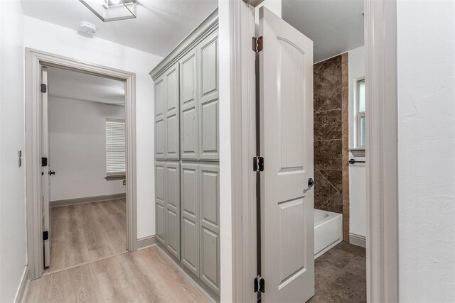 328 SW 175th Ter, Oklahoma City, OK 73170 - corridor with baseboards and light wood finished floors