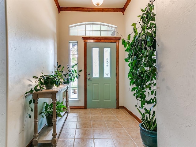 113 Stone Creek Dr, Midwest City, OK 73130 - entryway with crown molding, plenty of natural light, and baseboards
