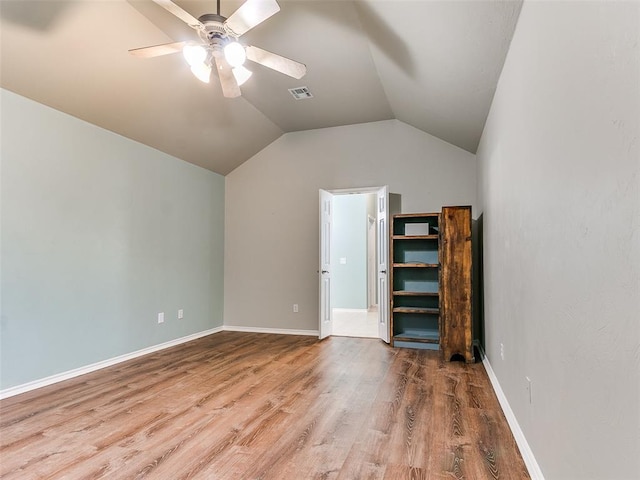 113 Stone Creek Dr, Midwest City, OK 73130 - additional living space with ceiling fan, wood finished floors, lofted ceiling, and baseboards