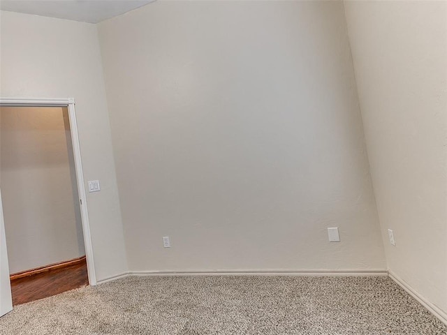 113 Stone Creek Dr, Midwest City, OK 73130 - spare room featuring carpet and baseboards